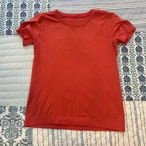 Lululemon Swiftly Tech Short-Sleeve Shirt 2.0
Hip Length Approx. size 10-12
